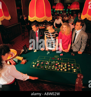People in Casino playing Roulette. Stock Photo