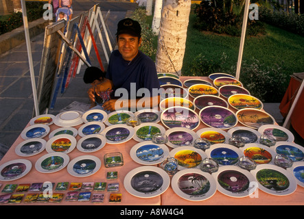 1, one, Mexican man, adult man, street vendor, seller, selling decorative plates, Puerto Vallarta, Jalisco State, Mexico Stock Photo