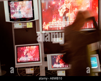 A customer browses large screen televisions in a Best Buy electronics Stock Photo: 79629664 - Alamy
