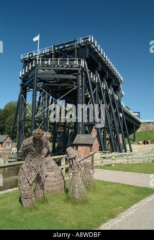 Corn Dollies in Foreground of Anderton Boat Lift near Barnton Cheshire England United Kingdom UK Stock Photo