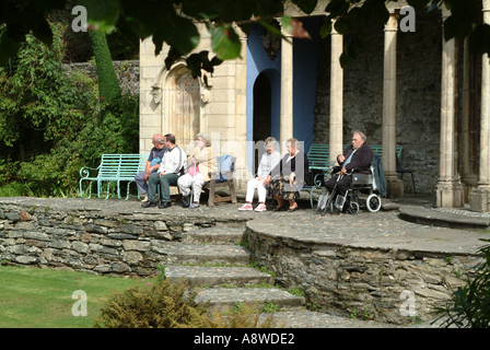 Old People Relaxing in the Piazza Area at Portmeirion Village Wales United Kingdom UK Stock Photo