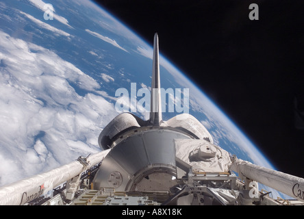 Space Shuttle Discoverys aft cargo bay its vertical stabilizer and orbital manoeuvering system Stock Photo