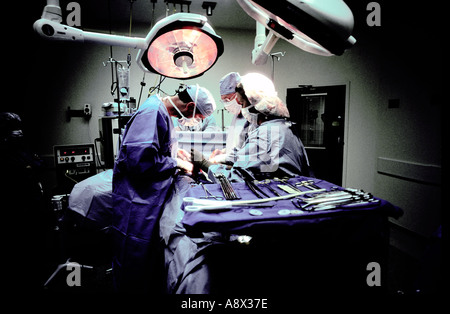 Surgical team performs kidney transplant in operating room Stock Photo