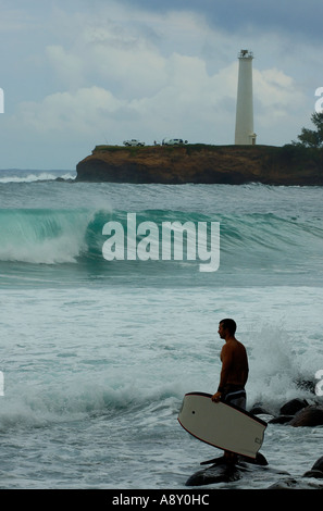 Surfing at Lighthouse Kohala Hawaii Stock Photo