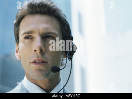 Man wearing headset Stock Photo