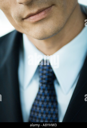 Businessman, close-up view of lower face and tie Stock Photo