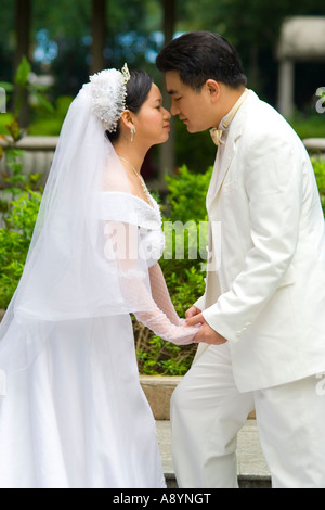 Chinese Couples Pose for Wedding Photos Shamian Island Guangzhou China Stock Photo