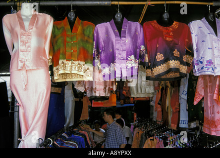 Thai traditional and contemporary clothes on display at Chatuchak market in Bangkok Thailand Stock Photo