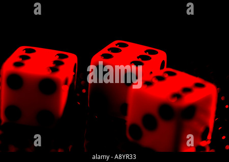 dice roll rolling luck lucky pair of dice die gamble gambling play playing risk bet las vegas casino betting win lose winner los Stock Photo