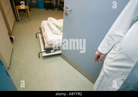 surgeon with his makeshift bed while on night duty Stock Photo