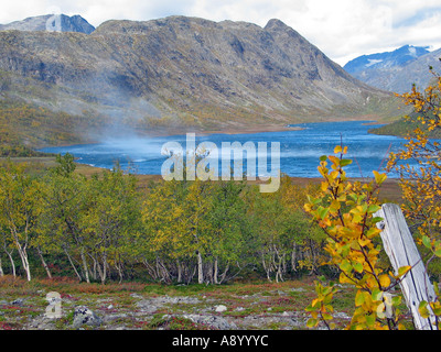 Wind playing over a lake in Jotunheimen during the turning of the seasons / Indian summer, Jotunheimen, Norway Stock Photo