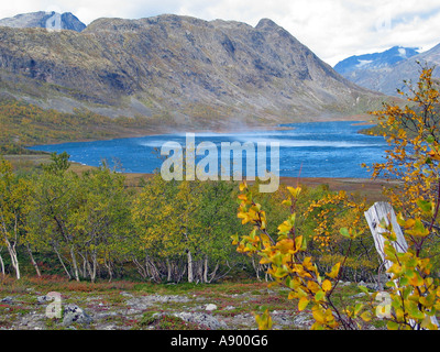 Wind playing over a lake in Jotunheimen during the turning of the seasons / Indian summer, Jotunheimen, Norway Stock Photo