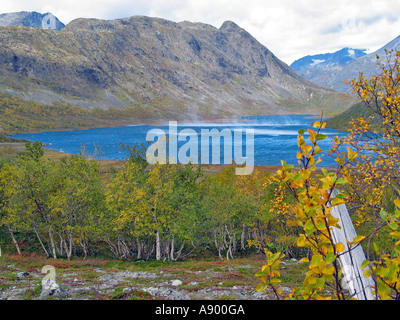 Wind playing over a lake in Jotunheimen during the turning of the seasons / Indian summer, Jotunheimen, Norway Stock Photo