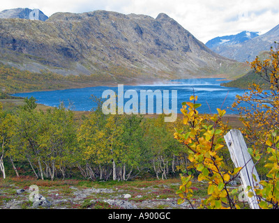 Wind playing over a lake in Jotunheimen during the turning of the seasons / Indian summer, Jotunheimen, Norway Stock Photo