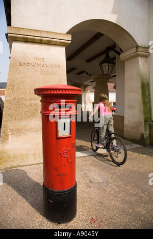 Red type 'A' letterbox outside Brownsword Market Building in Poundbury. Dorchester. Dorset UK Stock Photo