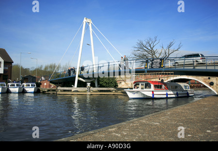 River cruiser passing under Wroxham Bridge. Norfolk Broads England UK ...