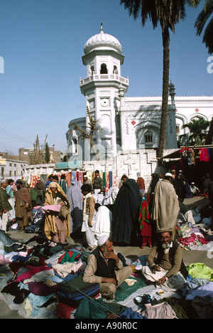 Pakistan NWFP Peshawar Old City Mosque and clothing market Stock Photo