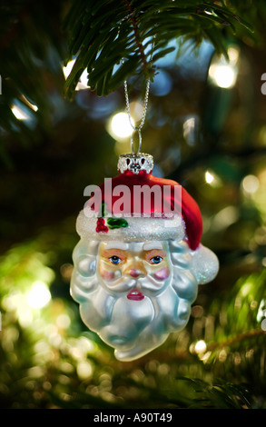 Santa Claus ornament on Christmas Tree Stock Photo