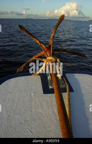 Maldives rusty anchor on the prow at sunset Stock Photo