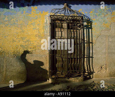 An effective and mysterious shadow on an old wall in Trinidad Cuba Stock Photo