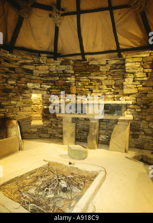 dh Replica SKARA BRAE ORKNEY Dresser and fireplace inside replica of prehistoric house neolithic reconstruction Stock Photo