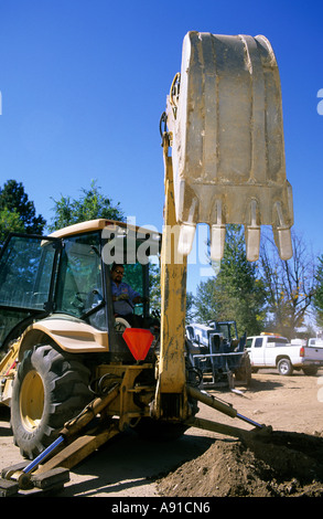 Backhoe bucket with teeth on a construction site in Boise, Idaho. Stock Photo