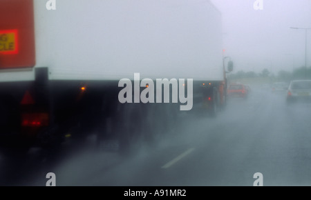 Poor visibility driving conditions in heavy rain; drivers point of view ...