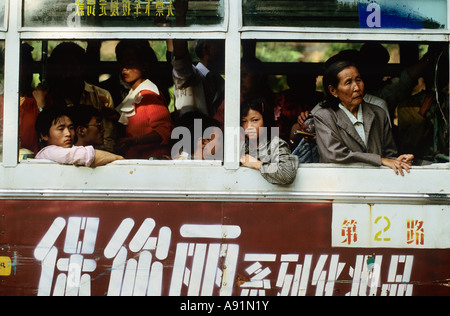 View of people in crowed bus, Kunming, Yunnan Province, China Stock Photo