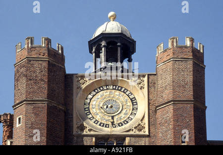 Historical Hampton Court Royal Palace close up of astronomical clock top of Anne Boleyn's Gate Tudor gatehouse Richmond on Thames London England UK Stock Photo
