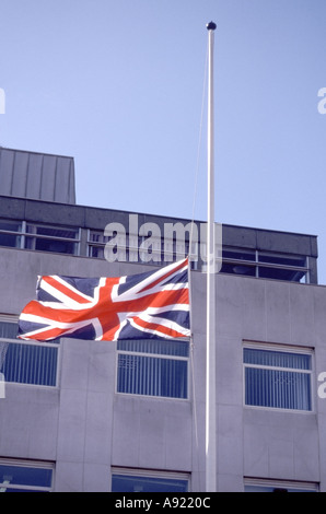 Union Jack flag at half mast at time of national mourning outside Chelmsford Police station building on Death of Diana Princess of Wales England UK Stock Photo