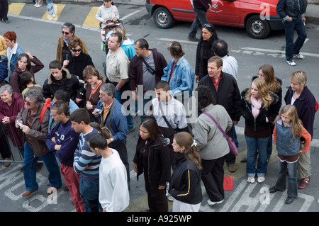 Arles France, Feria Bullfighting Festival, Street Scene, Large Crowd People on Street, Gathered to Look at Bulls After the kill on way out from Arena Stock Photo