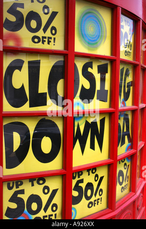 Shop with Closing Down signs in the window, Westport, County Mayo, Republic of Ireland Stock Photo