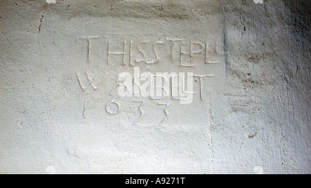 17th century inscription 'This steeple was built 1633'. Suffolk church East Anglia England UK Stock Photo