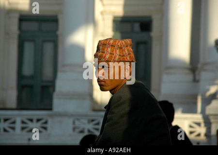 Portrait of a Newar man with traditional hat at Hanuman Dhoka Old Royal Palace Kathmandu Nepal Stock Photo