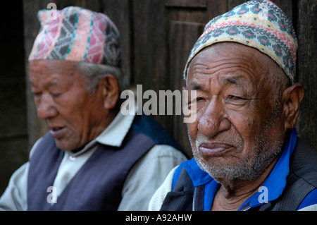 Portrait two old Newari men wearing traditional hats Bhaktapur Nepal Stock Photo