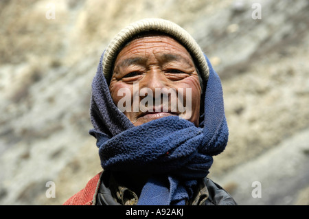Portrait proud man wearing coat cap and shawl Nar-Phu Annapurna Region Nepal Stock Photo