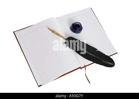 Quill Pen and Ink on an Open Journal cut out on white background Stock Photo