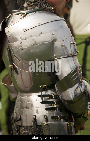 Knight man wearing replica armour at St Georges Day event Scarborough Castle North Yorkshire England UK United Kingdom GB Great Britain Stock Photo