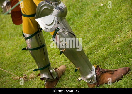 Man wearing replica armour at St Georges Day event Scarborough Castle North Yorkshire England UK United Kingdom GB Great Britain Stock Photo