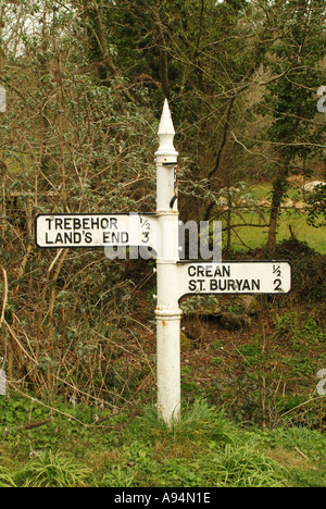 Old white signpost pointing to Lands End, Cornwall, England, UK. Stock Photo