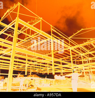 man standing in front of steelwork construction site Stock Photo - Alamy