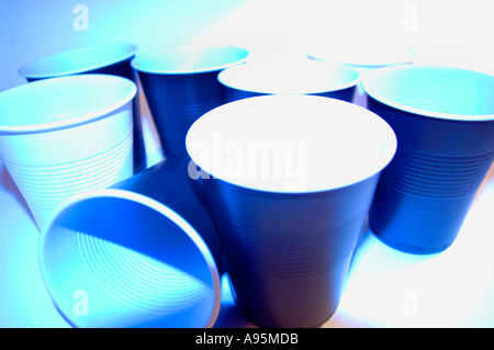 Plastic coffee cups in tungsten lighting Stock Photo