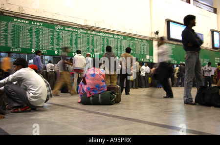 Passengers waiting at Railway Station, Ahmedabad, Gujarat, India Stock Photo