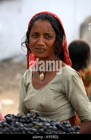 Tribal Indian woman from Kutch district at bus-stand, Bhuj, Gujarat, India Stock Photo