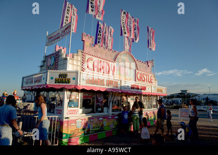 Colorful concession stand against blue sky at fairgrounds. Stock Photo