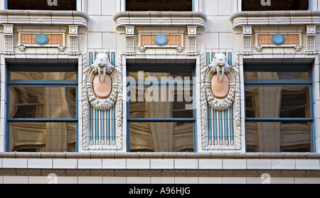 Walrus stone designs carved on outside of Arctic Club Hotel Seattle USA Stock Photo