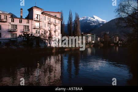 Interlaken Switzerland view of the Hotel Bellevue with the snow covered mountains in the background Stock Photo