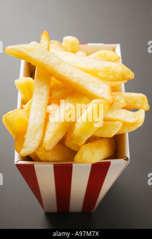 Chips in striped box FoodCollection Stock Photo