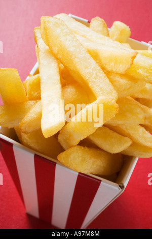 Chips in striped box FoodCollection Stock Photo