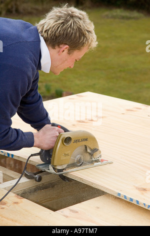 Cutting timber with circular saw hotsell